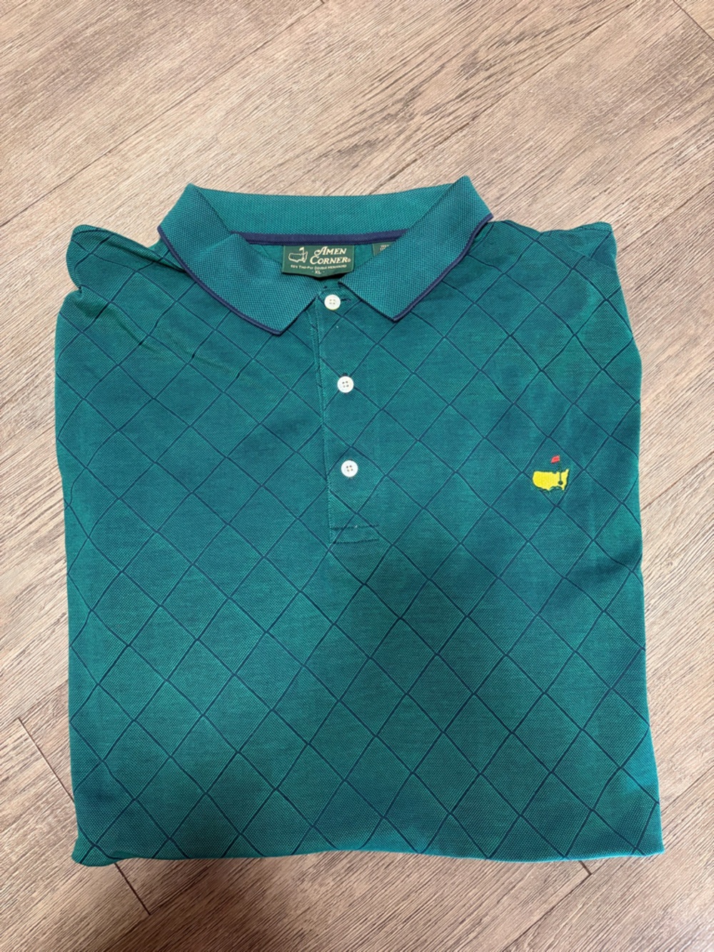 Amen Corners Teal Diamond-Grid Golf Polo with Yellow Embroidered Motif